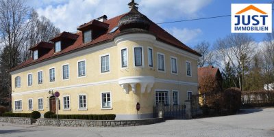 Eigentumswohnung im klassischen Stil mit Terrasse und Gartenanteil