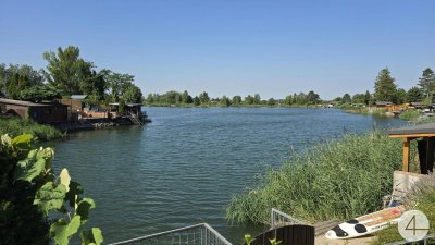 Ihr persönliches Paradies am See - charmantes Superädifikat!