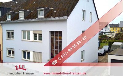 Trier-Euren: Charmantes Mehrfamilienhaus mit 3 Wohneinheiten, Garten und 3 Garagenstellplätzen für h