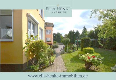 Gepflegte, schöne und helle Erdgeschoss-Wohnung mit Wintergarten + Gartennutzung.