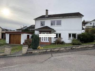 Freistehendes Einfamilienhaus ein toller Lage wartet auf nette Familie.