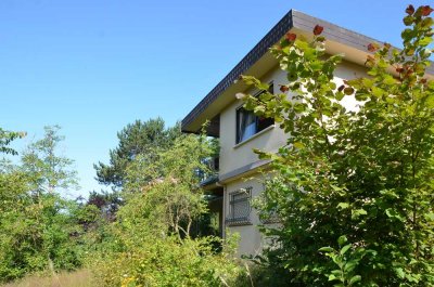 *HTR Immobilien* Tolles Einfamilienhaus mit großem Grundstück und Blick ins Maintal in Traumlage!