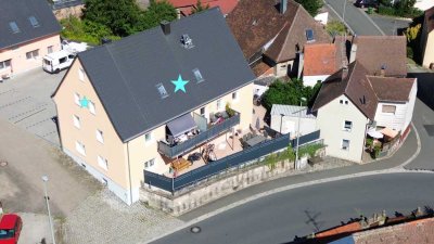 Vier-Zimmer-Wohnung im Dachgeschoss, Gartenanteil und Kfz-Stellplatz in Aurachtal-Münchaurach