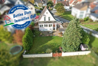 DIETZ: Tolles Einfamilienhaus mit Garten, 2 Terrassen, Doppelgarage und Keller in Großostheim!