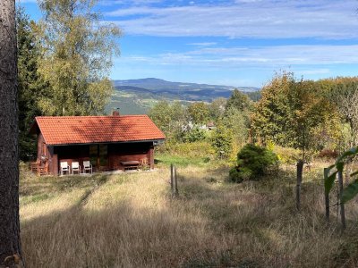 Idyllische Ferienhütte auf großem Baugrundstück