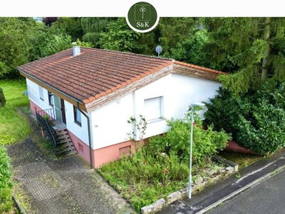 Einzigartiger Bungalow in ruhiger Ortsrandlage mit großem Garten und Ausbaupotenzial