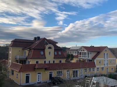 Erstbezug mit Balkon: Ansprechende 4-Zimmer-Erdgeschosswohnung mit geh. Innenausstattung